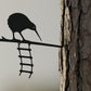 Tuindecoratie: Metalbird vogel op een ladder